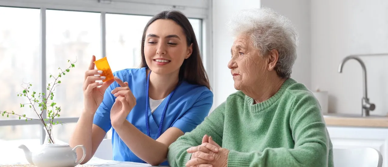 CMA teaching patient about medication